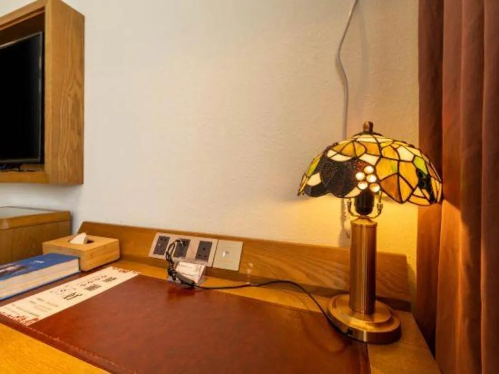 Bed in James Joyce Coffetel Beijing Yizhuang Development Zone Chicheng Times Square