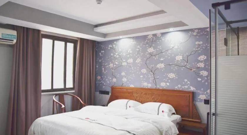 Bed in Pai Hotel Huai'an Lianshui Huaipu Bei Road