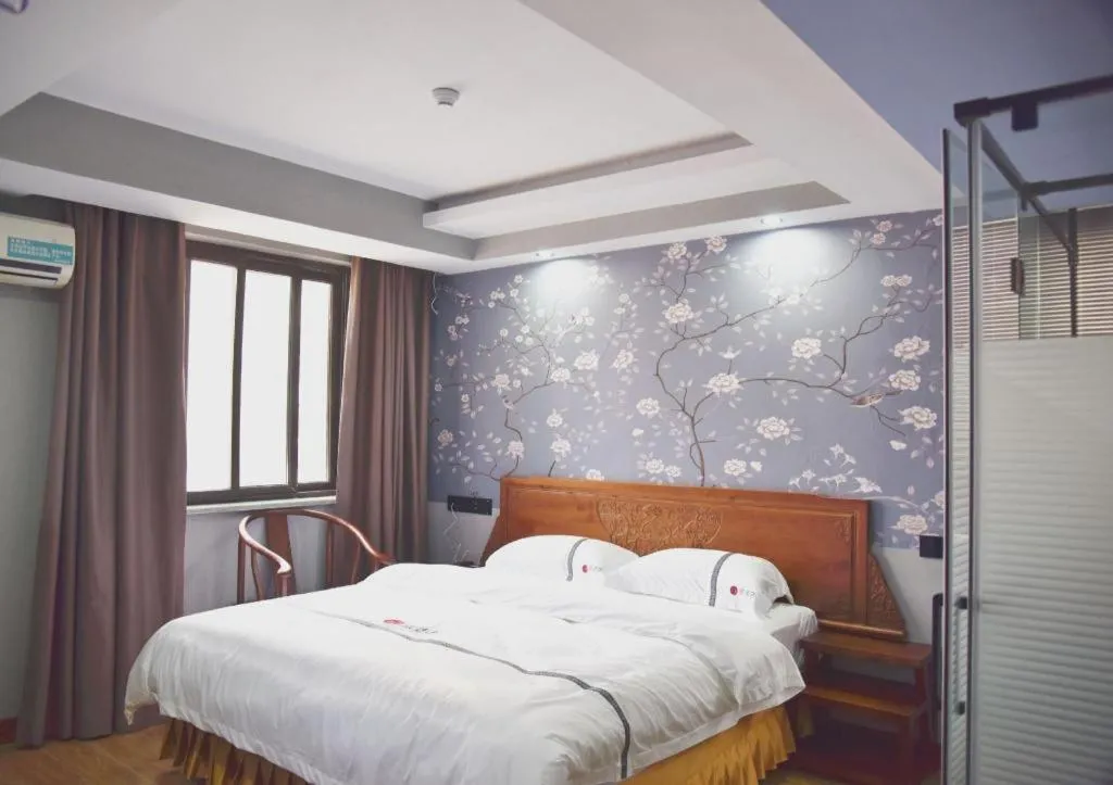 Bed in Pai Hotel Huai'an Lianshui Huaipu Bei Road