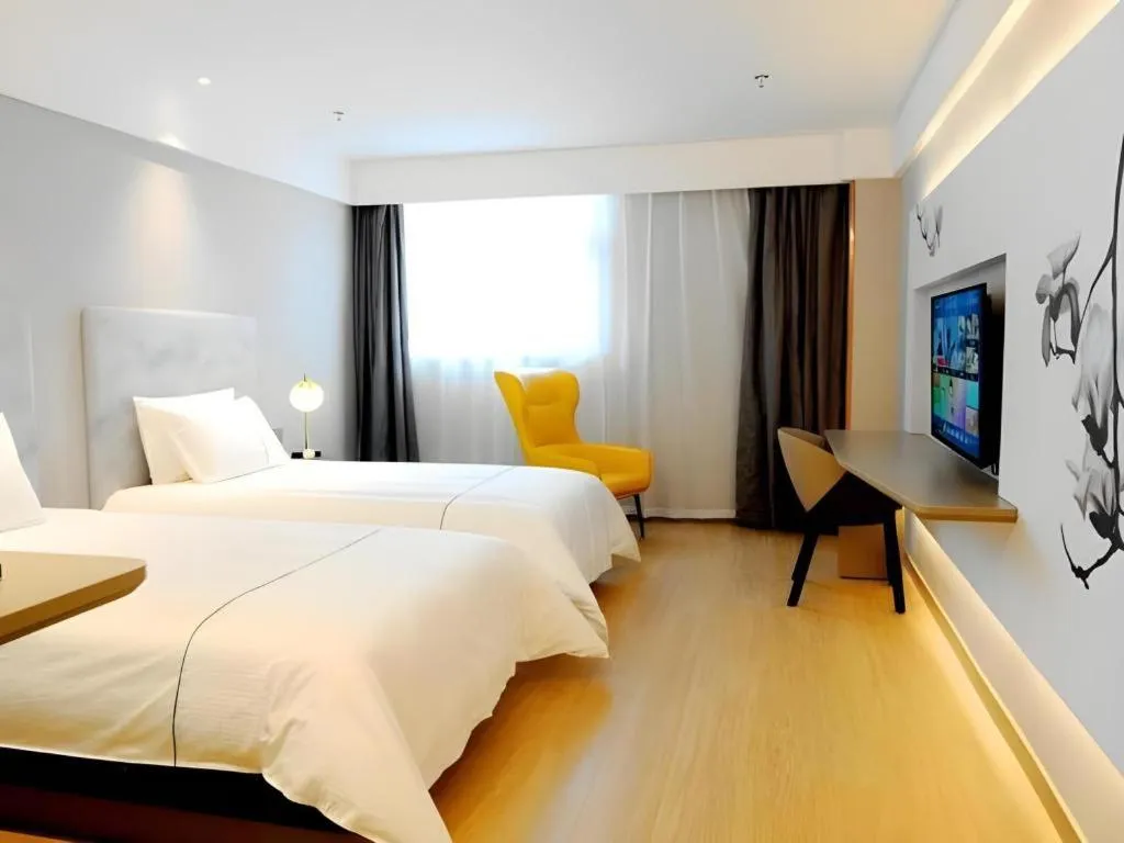 Bed in Magnotel Hotel Xuzhou Xinxin Yurun Plaza Zhongwu Road