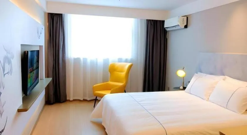 Bed in Magnotel Hotel Xuzhou Xinxin Yurun Plaza Zhongwu Road