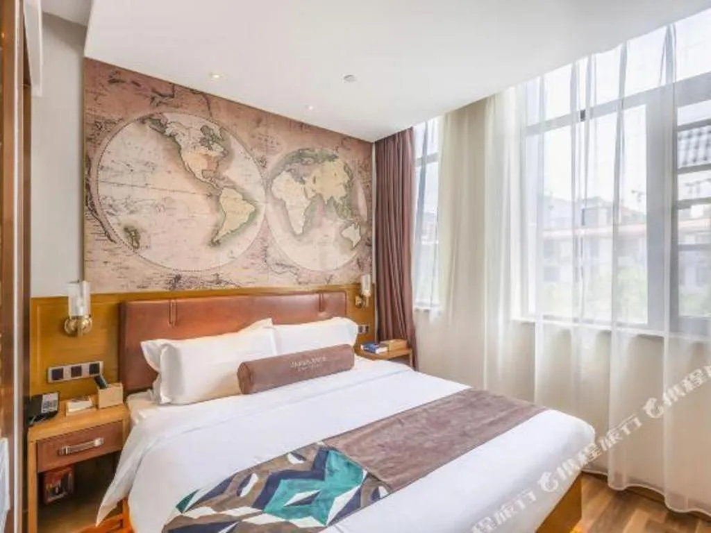 Bed in James Joyce Coffetel Luoyang Longmen High-speed Railway Station Baolong Plaza