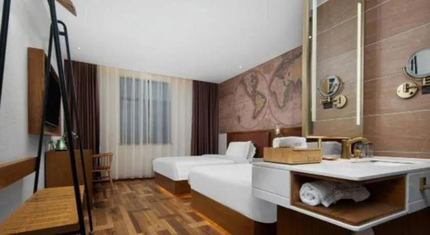 Bed in James Joyce Coffetel Luoyang Longmen High-speed Railway Station Baolong Plaza