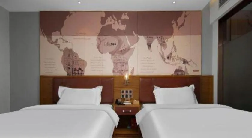 Bed in James Joyce Coffetel Luoyang Longmen High-speed Railway Station Baolong Plaza