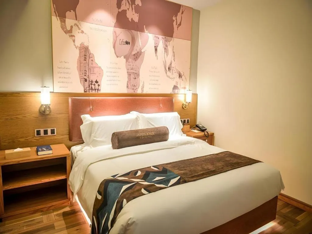 Bed in James Joyce Coffetel Luoyang Longmen High-speed Railway Station Baolong Plaza