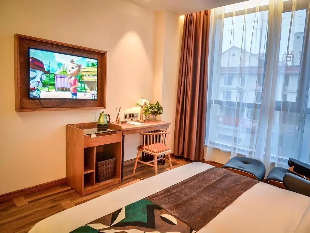 Bed in James Joyce Coffetel Luoyang Longmen High-speed Railway Station Baolong Plaza