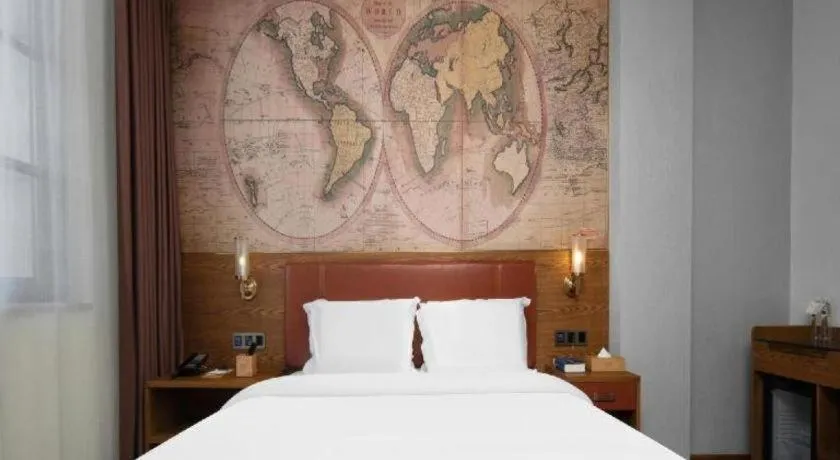 Bed in James Joyce Coffetel Luoyang Longmen High-speed Railway Station Baolong Plaza