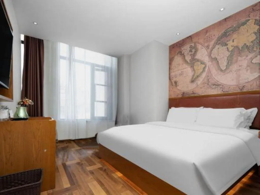 Bed in James Joyce Coffetel Luoyang Longmen High-speed Railway Station Baolong Plaza