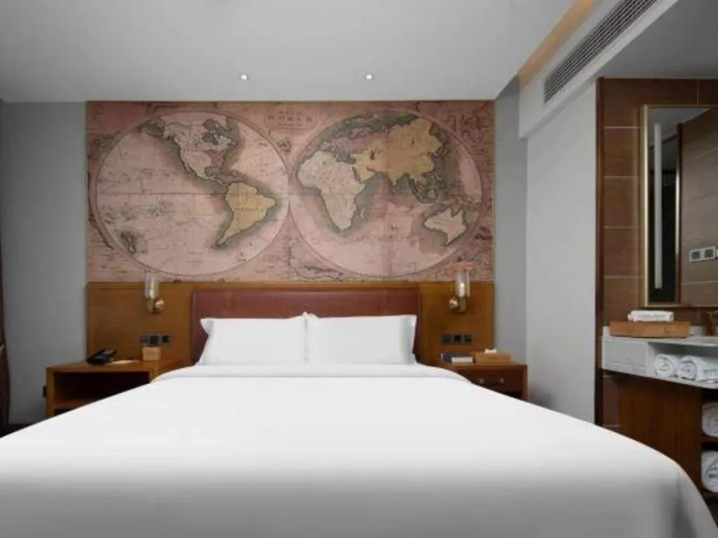 Bed in James Joyce Coffetel Luoyang Longmen High-speed Railway Station Baolong Plaza