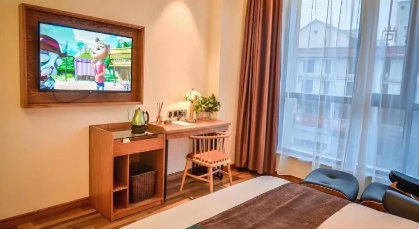 Bed in James Joyce Coffetel Luoyang Longmen High-speed Railway Station Baolong Plaza