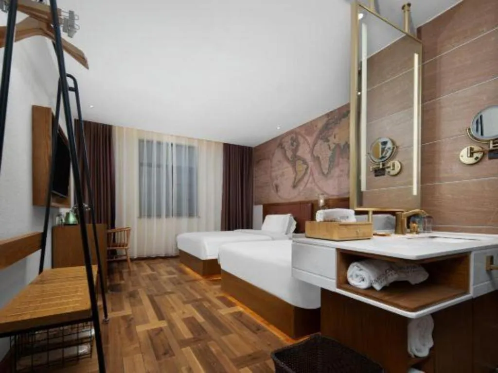 Bed in James Joyce Coffetel Luoyang Longmen High-speed Railway Station Baolong Plaza