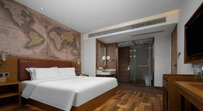 Bed in James Joyce Coffetel Luoyang Longmen High-speed Railway Station Baolong Plaza