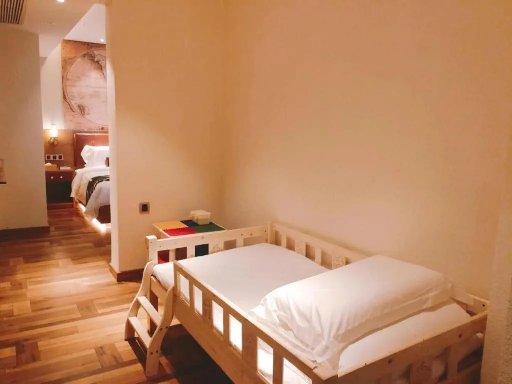 Bed in James Joyce Coffetel Luoyang Longmen High-speed Railway Station Baolong Plaza