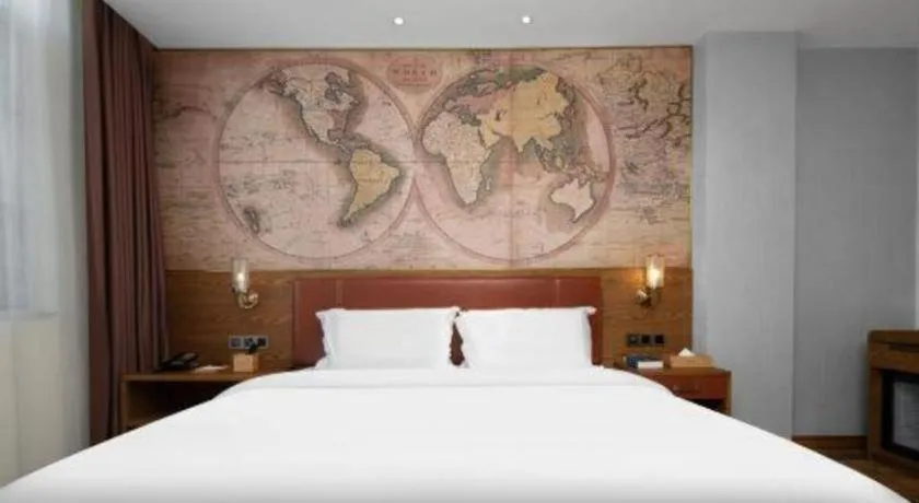 Bed in James Joyce Coffetel Luoyang Longmen High-speed Railway Station Baolong Plaza