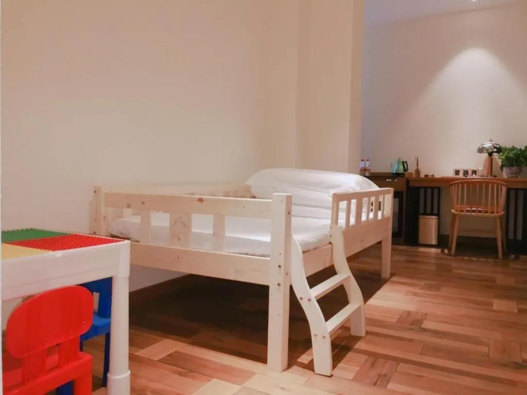 Bed in James Joyce Coffetel Luoyang Longmen High-speed Railway Station Baolong Plaza