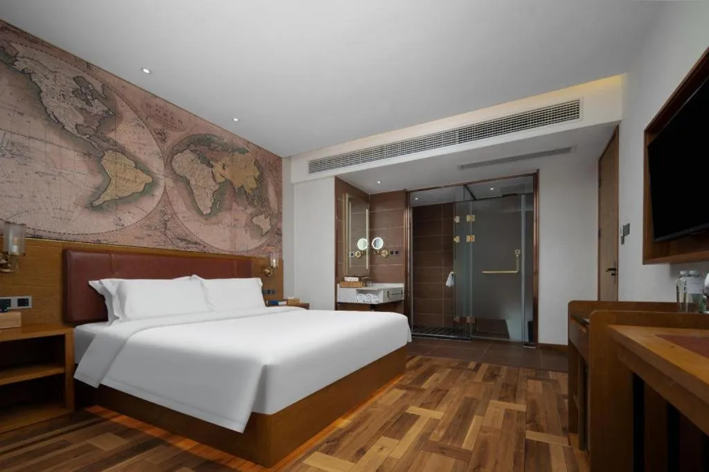 Bed in James Joyce Coffetel Luoyang Longmen High-speed Railway Station Baolong Plaza
