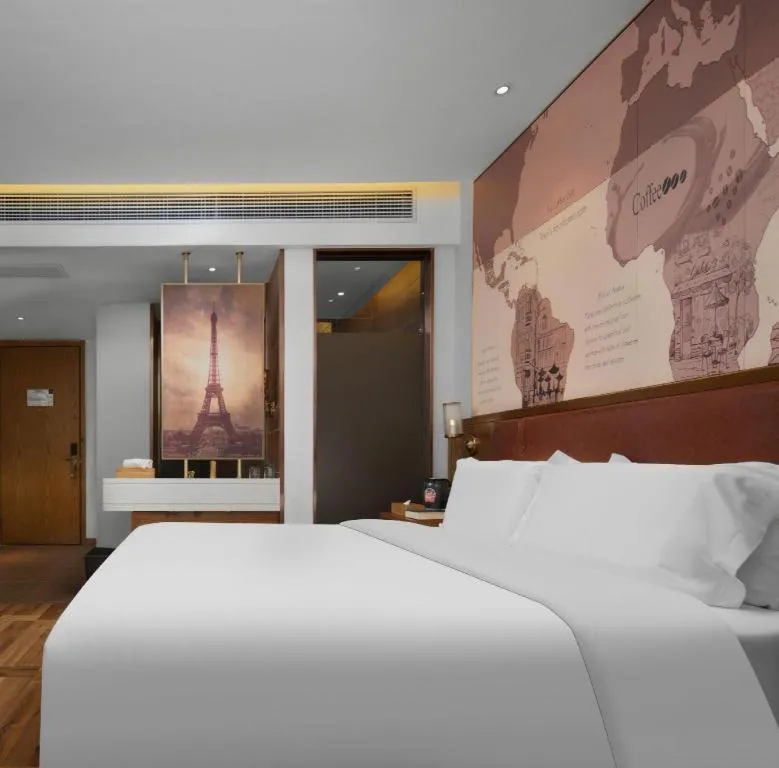 Bed in James Joyce Coffetel Luoyang Longmen High-speed Railway Station Baolong Plaza