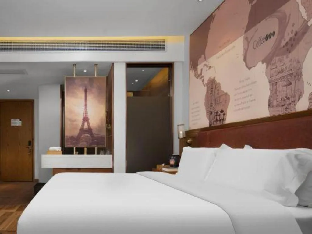 Bed in James Joyce Coffetel Luoyang Longmen High-speed Railway Station Baolong Plaza