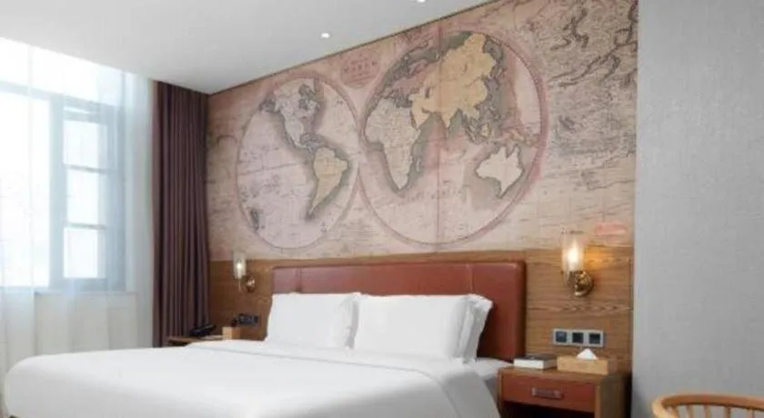 Bed in James Joyce Coffetel Luoyang Longmen High-speed Railway Station Baolong Plaza