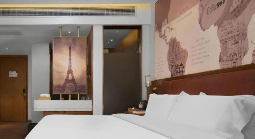 Bed in James Joyce Coffetel Luoyang Longmen High-speed Railway Station Baolong Plaza
