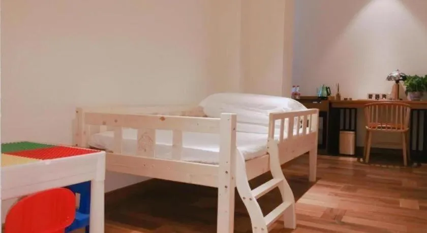 Bed in James Joyce Coffetel Luoyang Longmen High-speed Railway Station Baolong Plaza
