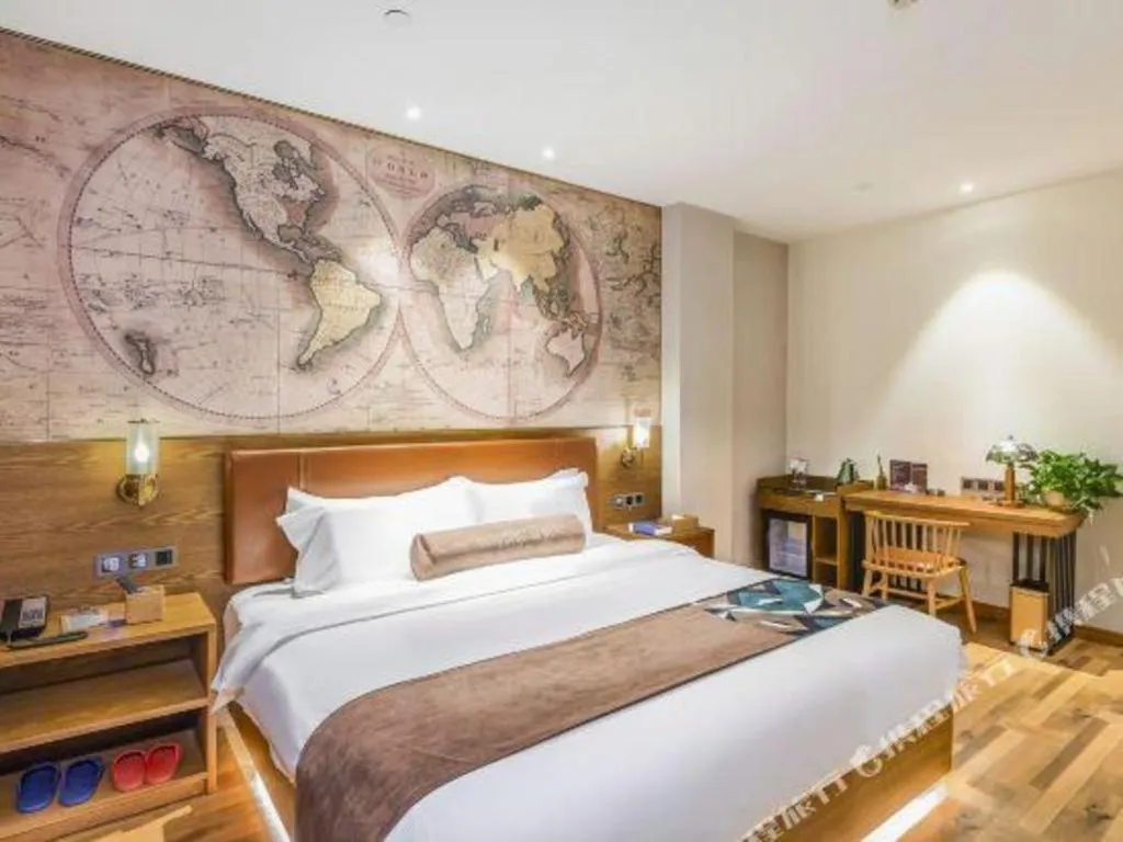 Bed in James Joyce Coffetel Luoyang Longmen High-speed Railway Station Baolong Plaza