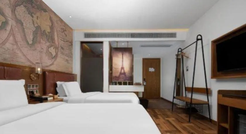 Bed in James Joyce Coffetel Luoyang Longmen High-speed Railway Station Baolong Plaza