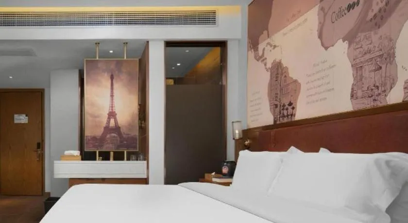 Bed in James Joyce Coffetel Luoyang Longmen High-speed Railway Station Baolong Plaza