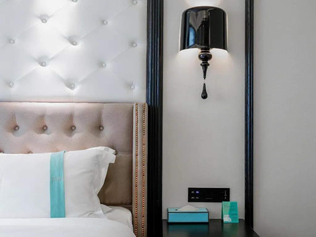 Bed in Xana Hotelle Zhongshan Fuhua Road