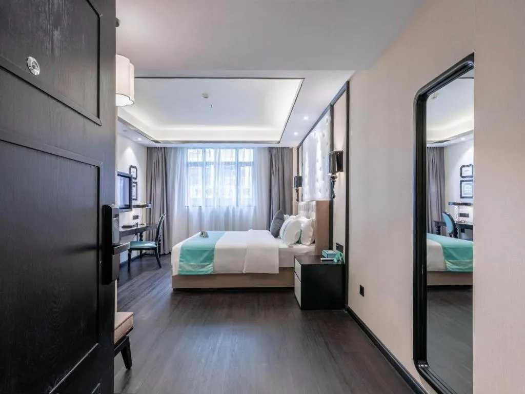 Bed in Xana Hotelle Zhongshan Fuhua Road