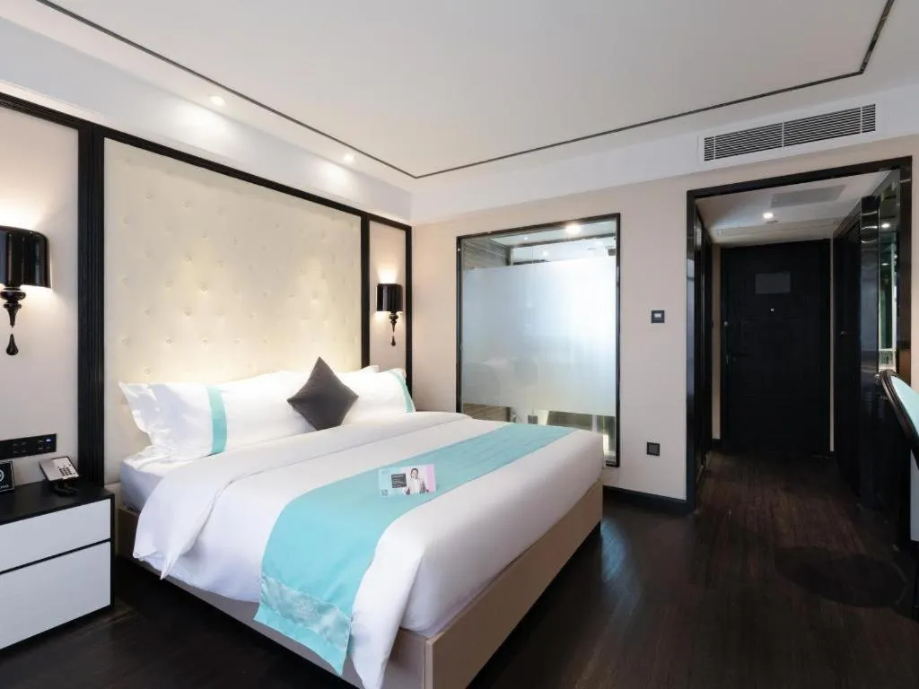 Bed in Xana Hotelle Zhongshan Fuhua Road