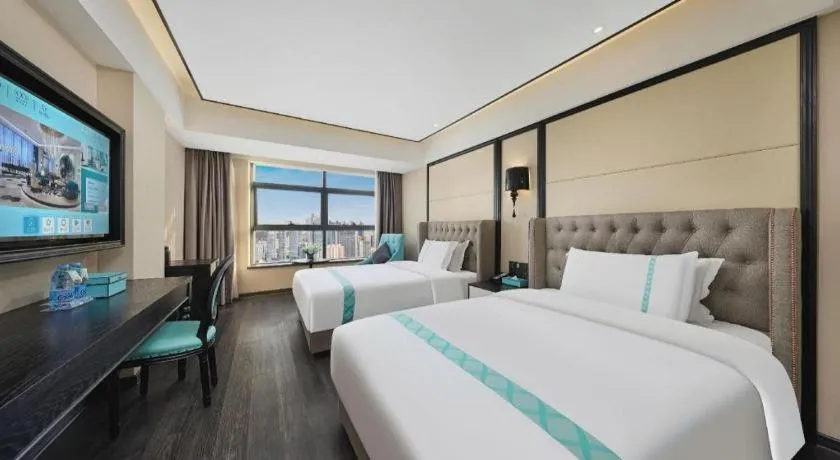 Bed in Xana Hotelle Zhongshan Bus Terminal Fuhuang Road Tianyuecheng