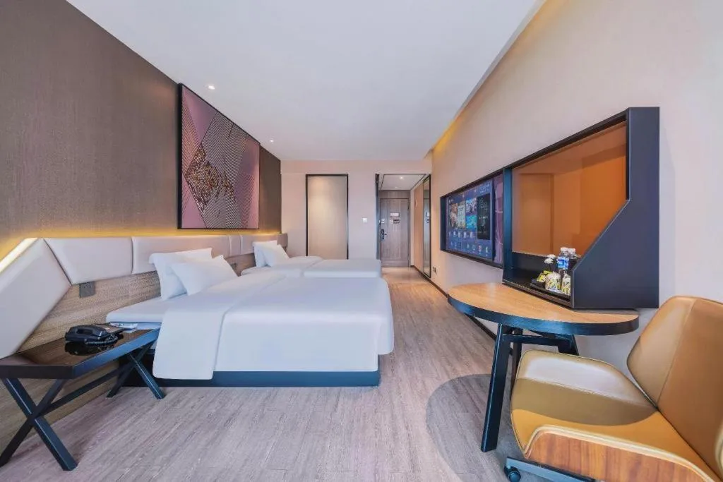 Bed in IU Hotel Chongqing Airport T3 Terminal