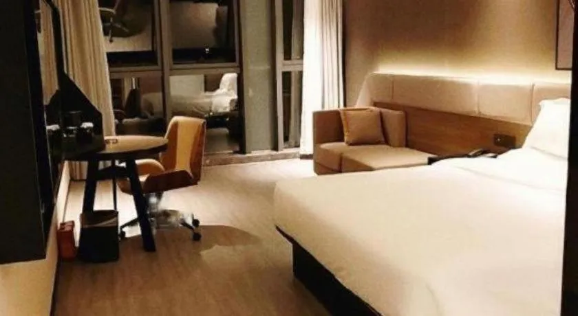 Bed in IU Hotel Chongqing Airport T3 Terminal