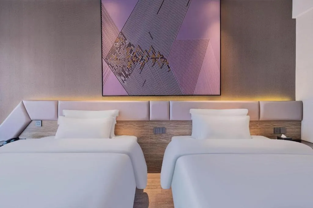 Bed in IU Hotel Chongqing Airport T3 Terminal