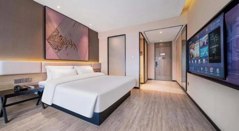 Bed in IU Hotel Chongqing Airport T3 Terminal