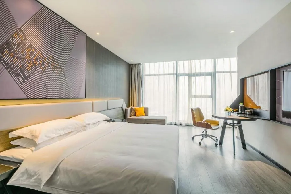 Bed in IU Hotel Chongqing Airport T3 Terminal