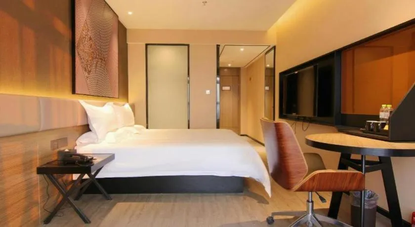 Bed in IU Hotel Chongqing Airport T3 Terminal
