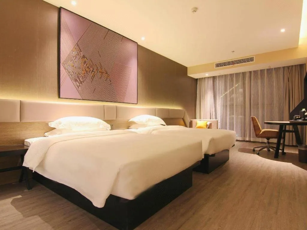 Bed in IU Hotel Chongqing Airport T3 Terminal