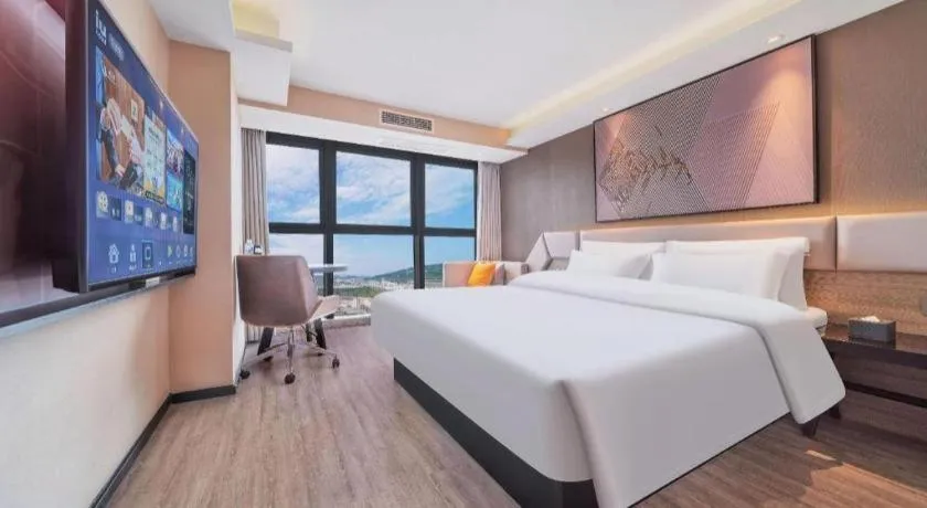 Bed in IU Hotel Chongqing Airport T3 Terminal