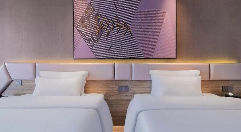 Bed in IU Hotel Chongqing Airport T3 Terminal