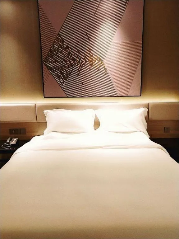 Bed in IU Hotel Chongqing Airport T3 Terminal