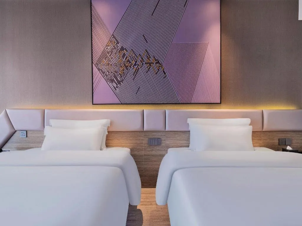 Bed in IU Hotel Chongqing Airport T3 Terminal