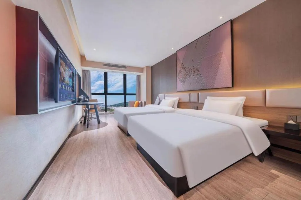 Bed in IU Hotel Chongqing Airport T3 Terminal