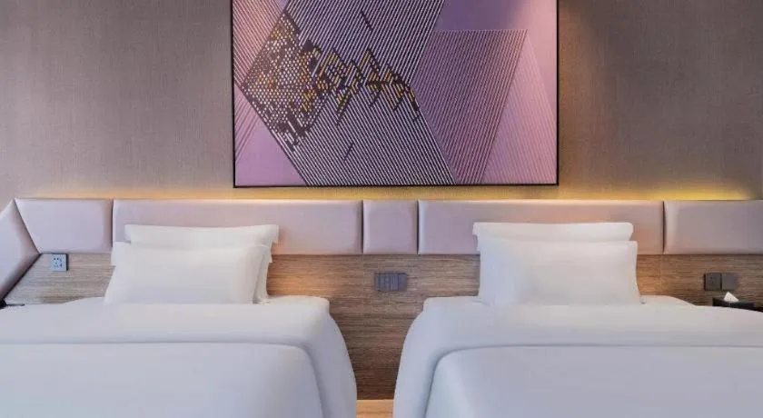 Bed in IU Hotel Chongqing Airport T3 Terminal