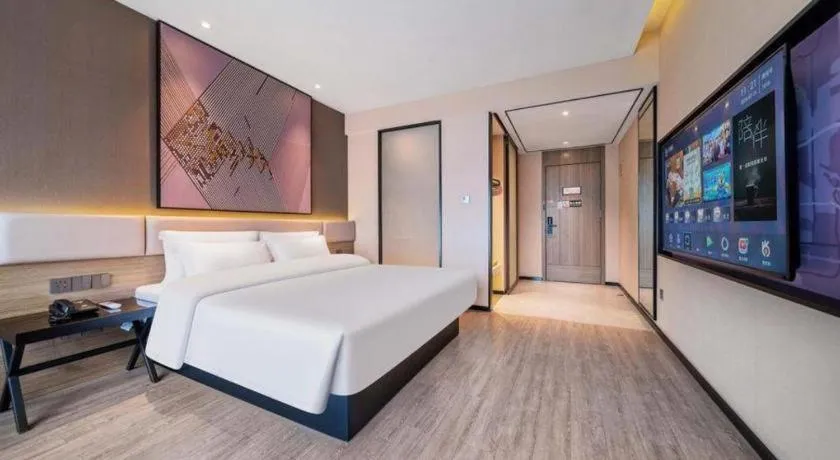 Bed in IU Hotel Chongqing Airport T3 Terminal