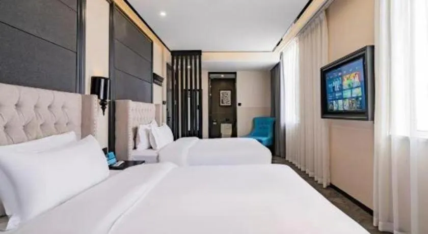 Bed in Xana Lite Hotelle Tianjin Huaming Binhai International Airport