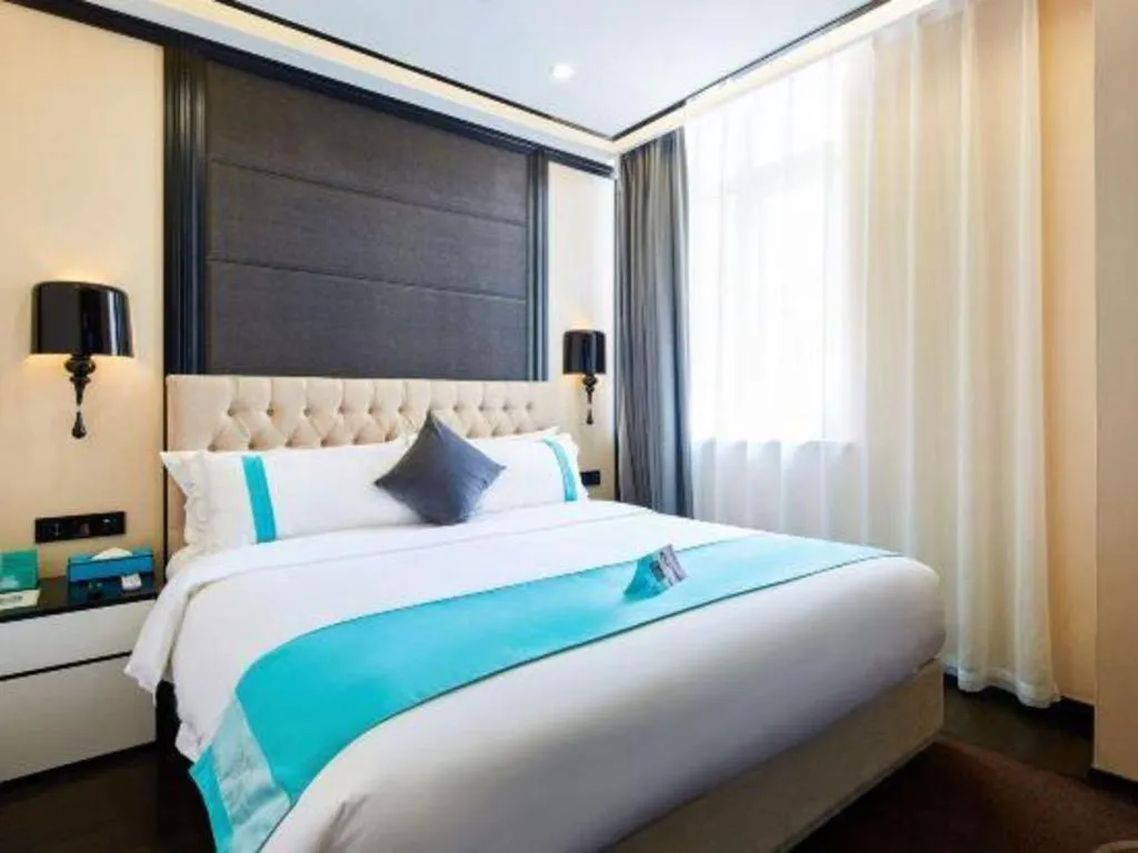 Bed in Xana Lite Hotelle Tianjin Huaming Binhai International Airport