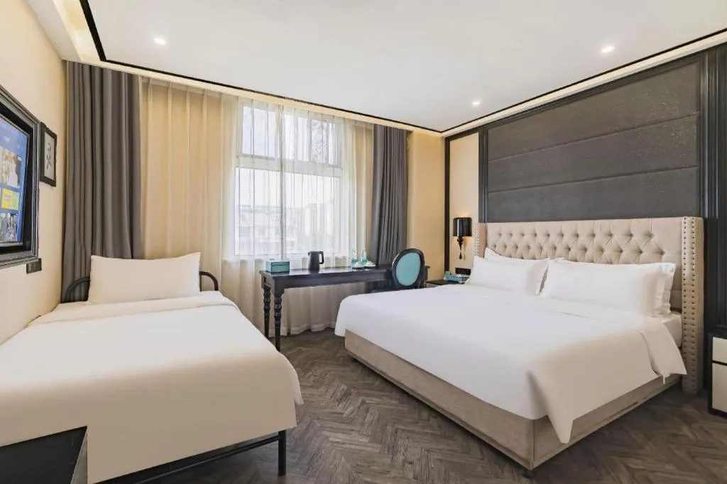 Bed in Xana Lite Hotelle Tianjin Huaming Binhai International Airport