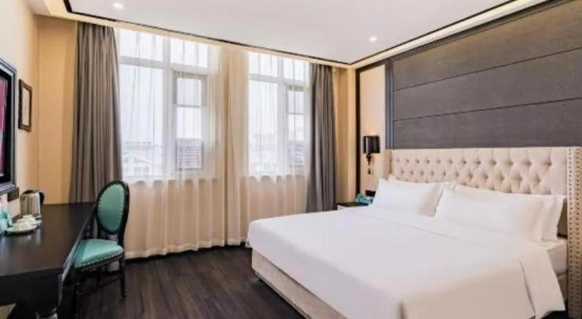 Bed in Xana Lite Hotelle Tianjin Huaming Binhai International Airport